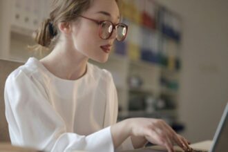 A young female using computer