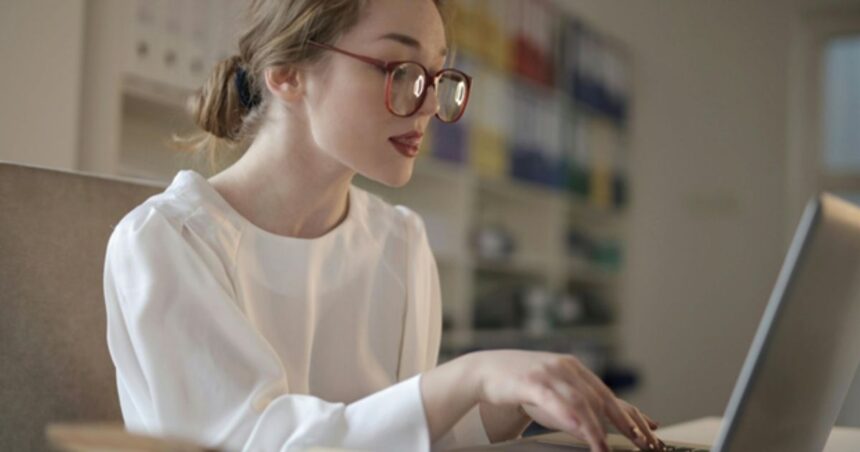 A young female using computer